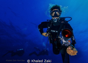 Ras Mohamed Red Sea Divers with a fish eye by Khaled Zaki 